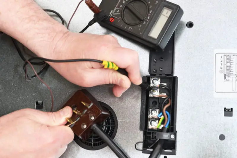 How to replace a burner on a glass top stove using multimeter